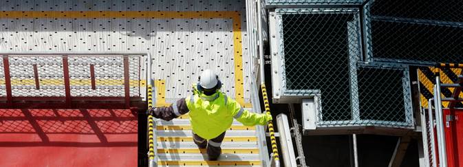 A picture containing building, athletic game, sport, fence

Description generated with very high confidence