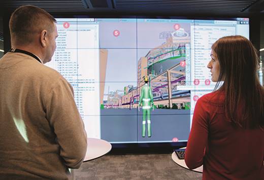 A picture containing person, indoor, standing, man

Description automatically generated