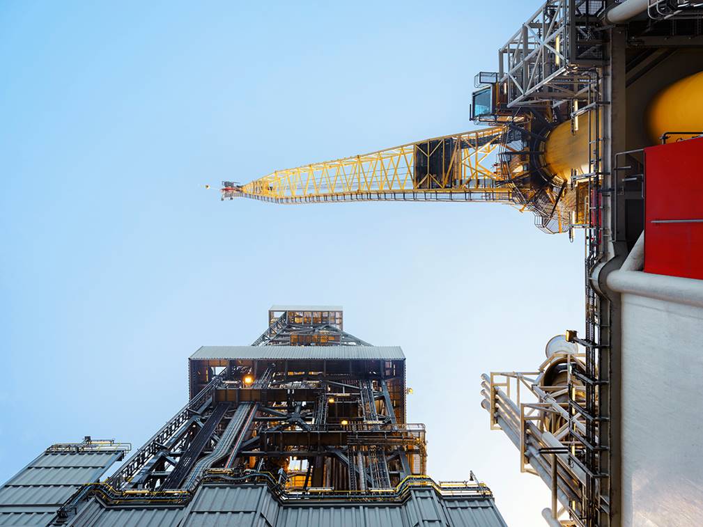 A crane over a city

Description automatically generated