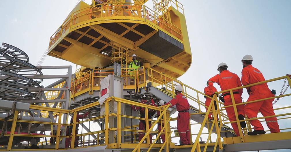 A picture containing yellow, building, man, boat

Description automatically generated